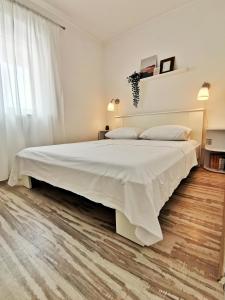 Posteľ alebo postele v izbe v ubytovaní Apartment Roman