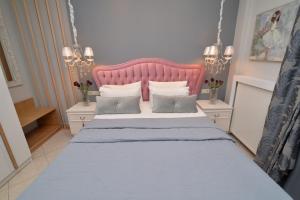 Krevet ili kreveti u jedinici u objektu Epavlis Luxury apts