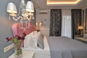 Posteľ alebo postele v izbe v ubytovaní Epavlis Luxury apts