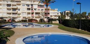 Bazén v ubytovaní Las Marinas Grand Terrace alebo v jeho blízkosti
