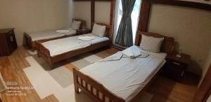 Una cama o camas en una habitación de Podgorski An