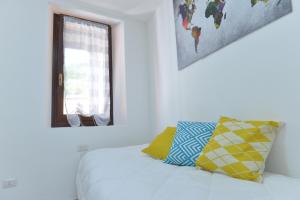 Postel nebo postele na pokoji v ubytování Casa CarMa