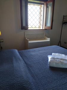 Letto o letti in una camera di Antico Rustico
