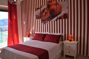 A bed or beds in a room at Melograno Home