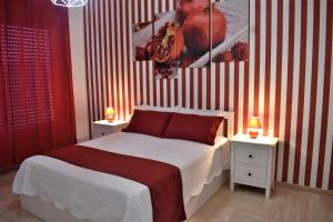 A bed or beds in a room at Melograno Home
