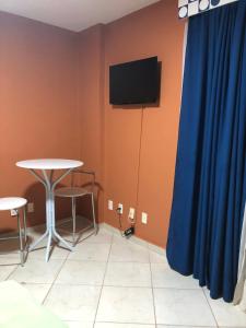 Et tv og/eller underholdning på Flat thermas place - caldas novas