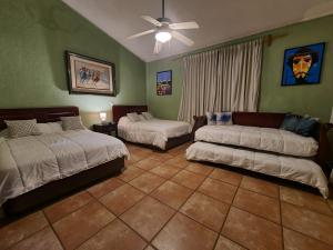 Letto o letti in una camera di Casa del Arte, a luxury beachfront villa with private pool