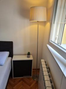 Postel nebo postele na pokoji v ubytování Apartman Veselinovic Free PARKING