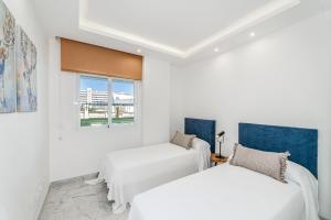 Postel nebo postele na pokoji v ubytování New and Modern Apartment in the heart of Puerto Banús