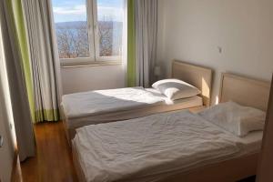 Llit o llits en una habitació de Apartment Jadranka Selce No 64