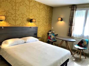 Cama ou camas em um quarto em Castel Fleuri