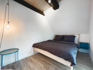 Кровать или кровати в номере Pauernhof Ferienwohnungen