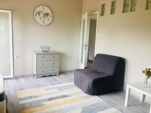 Posezení v ubytování Lelle-kert Apartman 01
