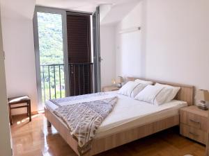 Postel nebo postele na pokoji v ubytování Lavender Bay Apartment D9