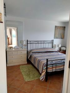 Ένα ή περισσότερα κρεβάτια σε δωμάτιο στο Villa Clementina