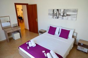 Ένα ή περισσότερα κρεβάτια σε δωμάτιο στο Casa Ideale 3