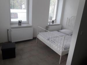 Postel nebo postele na pokoji v ubytování Stylový byt v mikroregionu Šternbersko Uničovsko