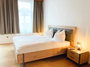 Posteľ alebo postele v izbe v ubytovaní APARTMENTS zum Wohlfühlen MARIAZELL
