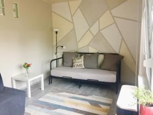 Posezení v ubytování Lelle-kert Apartman 01