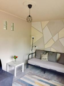 Posezení v ubytování Lelle-kert Apartman 01