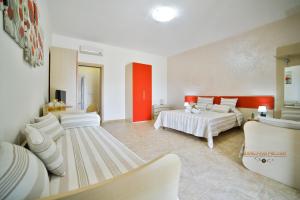 Postel nebo postele na pokoji v ubytování B&B La Casa di Attilio