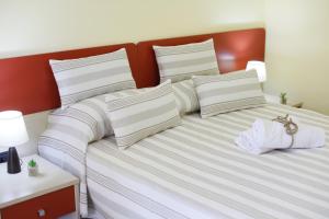 Postel nebo postele na pokoji v ubytování B&B La Casa di Attilio