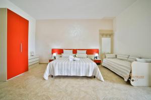 Postel nebo postele na pokoji v ubytování B&B La Casa di Attilio