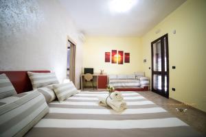 Postel nebo postele na pokoji v ubytování B&B La Casa di Attilio