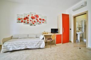 Postel nebo postele na pokoji v ubytování B&B La Casa di Attilio