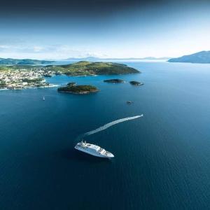 a cruise ship in a large body of water at Villa Shpetim Zogaj. in Ksamil