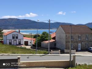 Fotografia z galérie ubytovania Casa Playa de Caldebarcos v destinácii Carnota