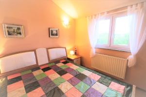 Postel nebo postele na pokoji v ubytování Apartments Coral, Klimno, island Krk