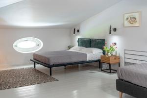 Letto o letti in una camera di BORGO DEL FRANCO