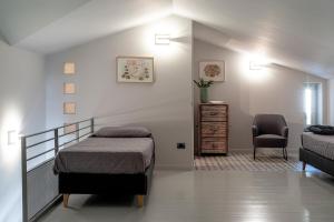 Letto o letti in una camera di BORGO DEL FRANCO