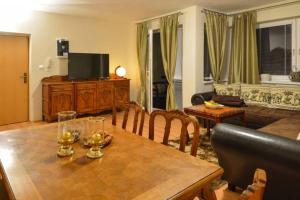 A seating area at Apartman Tereza Pine wood