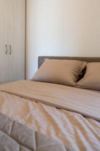 Postel nebo postele na pokoji v ubytování Aqualux apartments
