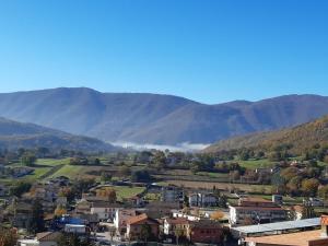 a small town in a valley with mountains in the background at Affittacamere da Angela in Borgorose