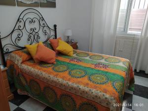 Postel nebo postele na pokoji v ubytování Los Tres Girasoles