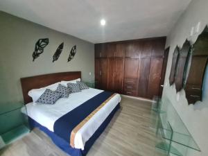 เตียงในห้องที่ Casa Arandas Hotel - Suits