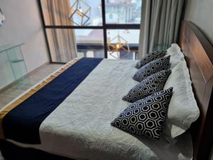 เตียงในห้องที่ Casa Arandas Hotel - Suits