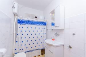 Koupelna v ubytování Apartments Kursan