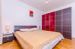 Postel nebo postele na pokoji v ubytování Apartments Kursan