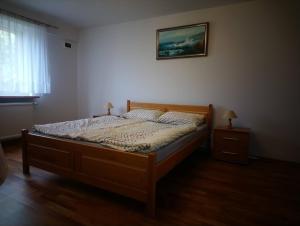 Posteľ alebo postele v izbe v ubytovaní Agroturystyka Pod Brzozami