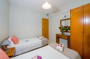Postel nebo postele na pokoji v ubytování Giannarakis Beach
