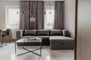 Posezení v ubytování NOVA Apartamenty&Pokoje