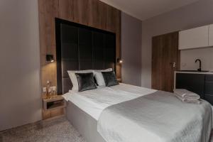 Postel nebo postele na pokoji v ubytování NOVA Apartamenty&Pokoje