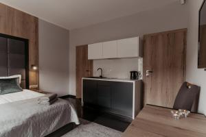 Postel nebo postele na pokoji v ubytování NOVA Apartamenty&Pokoje
