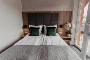 Postel nebo postele na pokoji v ubytování NOVA Apartamenty&Pokoje