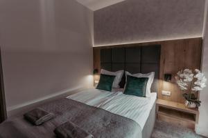 Postel nebo postele na pokoji v ubytování NOVA Apartamenty&Pokoje