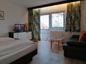 Fotografia z galérie ubytovania Hotel Garni Bernhard am See v destinácii Walchsee